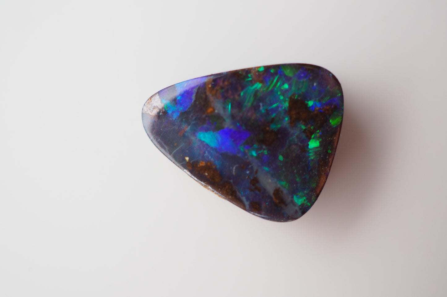 Dark Boulder Opal Filled with Flashes