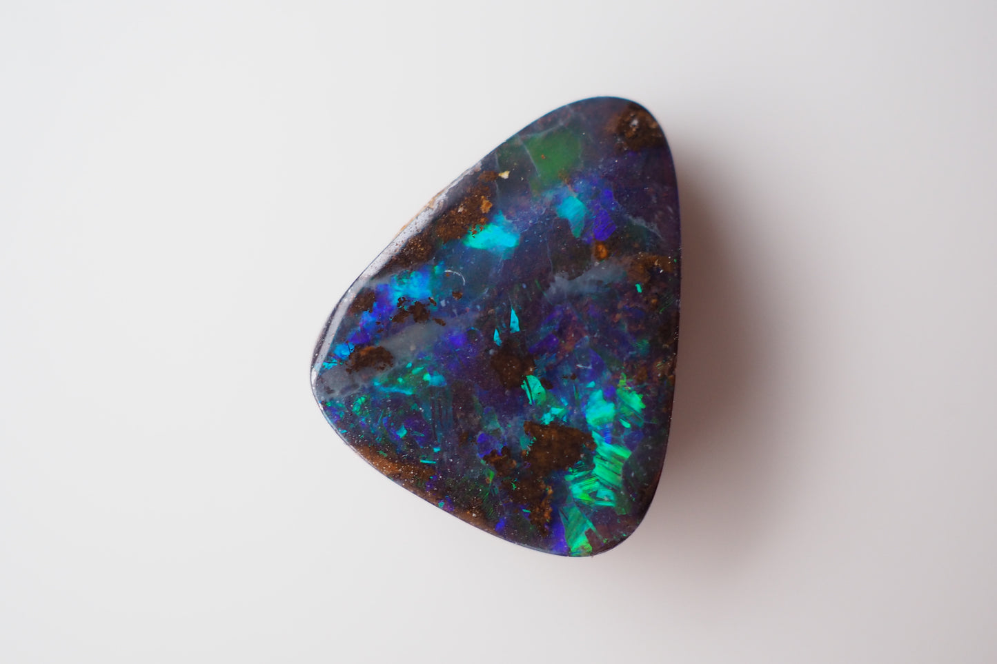 Dark Boulder Opal Filled with Flashes