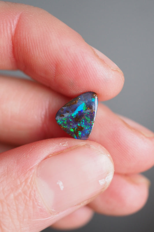 Dark Boulder Opal Filled with Flashes