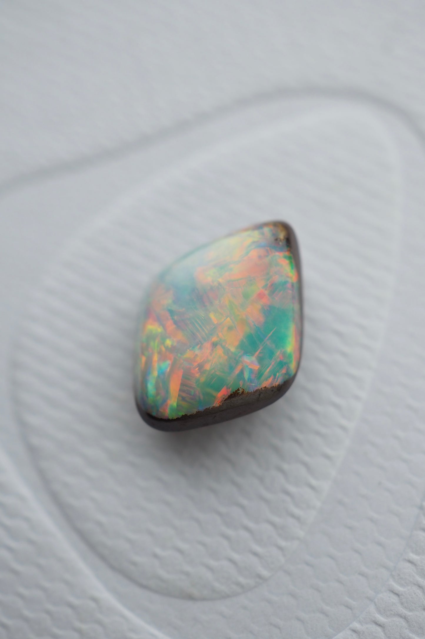 Kite Shaped Rainbow Filled Boulder Opal