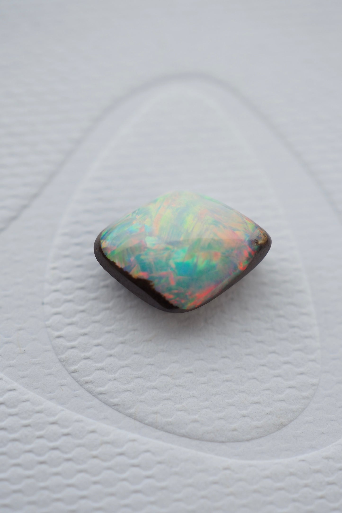 Kite Shaped Rainbow Filled Boulder Opal